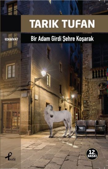 Bir Adam Girdi Şehre Koşarak, Tarık Tufan